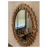 Ornate frame oval mirror