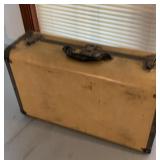 Old hard shell travel luggage