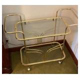 Brass colored metal and glass tea cart