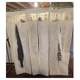 Rolling clothes stand with three hanging