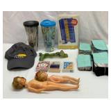 Peacock tumblers, Bass Pro hat, playing cards, etc