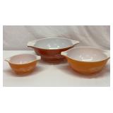 Three Pyrex Autumn Harvest mixing bowls