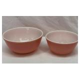 Two pink Pyrex mixing bowls. 7 inch and 9 inch.