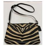Black and tan coach purse.  Fake.