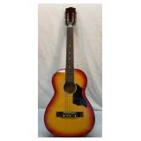 Guitar with steel strings and case. See desc