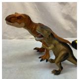 Two battery operated T Rex