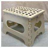 Collapsible footstool. 9 inches tall.