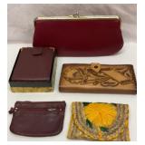 Clutch, wallets, change purses. Most are leather.