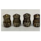Four sterling silver salt and peppers