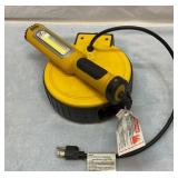 Cord reel shop light with magnet
