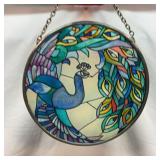 Peacock suncatcher,  4 1/2 inches wide.