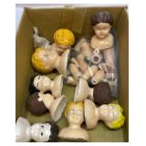 Old ceramic doll heads and leg parts
