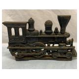Old cast iron train engine doorstop