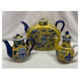 Blue yellow ceramic two tea pots and water pitcher