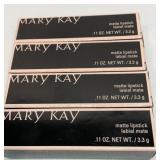 Four Mary Kay lipsticks. Paparazzi pink.