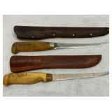 Two Vtg fillet knives with leather cases