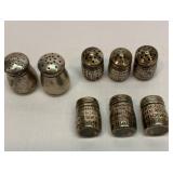 Eight sterling silver salt and pepper
