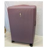 Travel Pro mauve hard shell suitcase