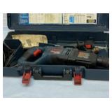 Bosch hammer drill. Works.