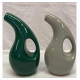 Two Rachael Ray olive oil dispensers with spouts