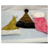 Two wizard hats and fluffy pink stocking