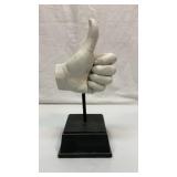Thumbs up hand statue