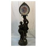 Sculptural swinging pendulum clock