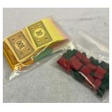Monopoly money and wood houses and hotels