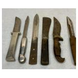 Group of fixed blade knives. See description.