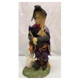 Halloween witch on a broom. 13 inches tall.