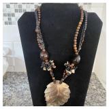 Metal Heart pendande Necklace on braided leather