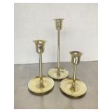 Trio of vintage brass candlestick holders in vari.
