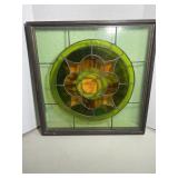 Antique framed leaded stained glass window featur.