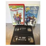 Collection of four The Wiggles VHS tapes, includi.