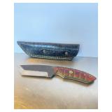 Custom fixed-blade hunting knife made from a file.
