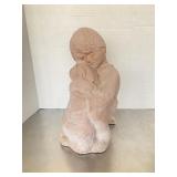 Terracotta or composition sculpture depicting a y.