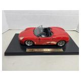 Maisto 1:18 scale die-cast red Porsche Boxster co.