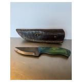 Custom fixed-blade knife crafted from a steel fil.