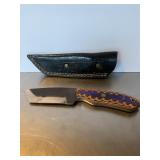 Custom fixed-blade knife crafted from a steel filh