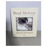 Hardcover copy of "Heroes for My Daughter" by Bra.