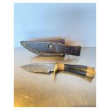 Handcrafted Damascus steel fixed-blade knife feat.