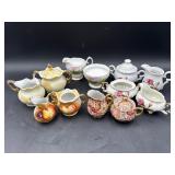 12-piece assorted creamers and sugar bowls.