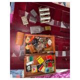 Lighters, keychains, match books, change dispenser