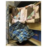Vintage quilt and blankets inside trunk