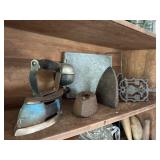 Antique irons trivet and Stone