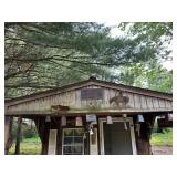 10 cowbells across the front of the cabin