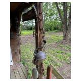 Vintage primitive hanging on right side of cabin