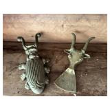 Brass boot jacks beetle, and cow