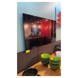 Samsung late-model 65 inch flatscreen with mount