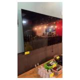 Samsung 65 inch late-model flatscreen with mount